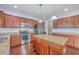 Well-equipped kitchen featuring an eat-in island, stainless steel appliances, and granite countertops at 531 Crossland Dr, Moncks Corner, SC 29461