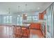 Well-lit kitchen featuring an eat-in island, granite countertops, and stainless steel appliances at 531 Crossland Dr, Moncks Corner, SC 29461