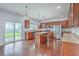 Bright kitchen featuring granite counters, stainless steel appliances, and an island with bar seating at 531 Crossland Dr, Moncks Corner, SC 29461