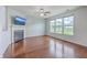 Bright living room featuring a fireplace, hardwood floors, and plenty of natural light at 531 Crossland Dr, Moncks Corner, SC 29461