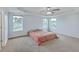 Spacious main bedroom featuring tray ceiling, neutral carpet, and natural light at 531 Crossland Dr, Moncks Corner, SC 29461