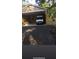 Carport featuring gravel driveway and ample space for parking at 5423 Buckeye Rd, Hollywood, SC 29449