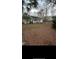 Well-maintained home with a charming front porch and ample yard space at 5423 Buckeye Rd, Hollywood, SC 29449