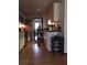 Galley kitchen with stainless steel appliances and sleek, white cabinetry at 5423 Buckeye Rd, Hollywood, SC 29449