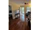 Comfortable living room with hardwood floors and access to the outdoors at 5423 Buckeye Rd, Hollywood, SC 29449
