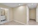 Empty bedroom with adjoining bathroom and closet spaces and light wood floors at 62 Wexford Way, Walterboro, SC 29488