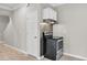 Compact kitchen area features a black oven, a decorative backsplash, and ample counter space for functionality at 62 Wexford Way, Walterboro, SC 29488