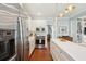 Well-equipped kitchen featuring stainless steel appliances, white cabinets, and an open layout at 66 Darlington Ave, Charleston, SC 29403
