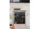 Close up of the built in mini bar with a wine fridge and an accent bowl on top at 66 Darlington Ave, Charleston, SC 29403