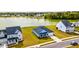 Beautiful lakeside community homes featuring manicured lawns and stunning water views at 6972 Pumpkinseed Dr, Johns Island, SC 29455