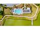 Overhead view of the community clubhouse, pool and pier with lake access surrounded by walking trails at 6972 Pumpkinseed Dr, Johns Island, SC 29455