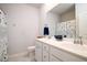 Bright bathroom featuring double sinks, a shower curtain, and plenty of counter space at 6972 Pumpkinseed Dr, Johns Island, SC 29455