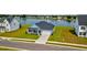 Well-maintained home with a lush lawn and blue exterior at 6972 Pumpkinseed Dr, Johns Island, SC 29455