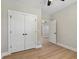 Bedroom with hardwood floors and view to another room at 709 Oakridge View Trl, Ridgeville, SC 29472