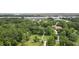 Green suburban area, showcasing the natural beauty of the surrounding trees and waterfront location at 7879 Gull Bay Dr, Awendaw, SC 29429