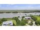 Waterfront home with a private dock and boat launch, offering stunning views of the surrounding marsh at 7879 Gull Bay Dr, Awendaw, SC 29429