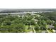 Waterfront property with an expansive aerial view of lush landscaping and mature trees at 7879 Gull Bay Dr, Awendaw, SC 29429
