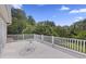 Top floor balcony with serene treetop views, perfect for relaxing and enjoying the outdoors at 7879 Gull Bay Dr, Awendaw, SC 29429