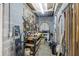 Workshop in basement with pegboard tool organizer and work table at 7879 Gull Bay Dr, Awendaw, SC 29429