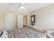 Serene bedroom with ample closet space and doorways, and light-colored walls, and decor at 7879 Gull Bay Dr, Awendaw, SC 29429
