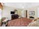 Relaxing bedroom featuring traditional furnishings, decor, and interior access to connecting rooms at 7879 Gull Bay Dr, Awendaw, SC 29429
