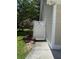 Side yard with a white privacy fence and well-maintained landscaping at 7879 Gull Bay Dr, Awendaw, SC 29429