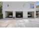 Three-car garage with ample parking space and individual door access at 7879 Gull Bay Dr, Awendaw, SC 29429