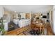 Spacious open-concept living area with eat-in kitchen and dining area, lots of natural light at 7879 Gull Bay Dr, Awendaw, SC 29429