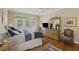 Bright main bedroom with a private deck, providing a relaxing space at 7879 Gull Bay Dr, Awendaw, SC 29429