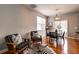 Cozy dining area featuring a round table, modern chairs, and a zebra hide rug at 8938 Planters Row Ln, Summerville, SC 29485