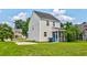 Well-maintained home featuring a screened porch and a spacious backyard at 8938 Planters Row Ln, Summerville, SC 29485
