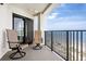 Relax on this ocean-view balcony with comfortable seating and enjoy the sea breeze at 9002 Palmetto Dr # 420, Isle of Palms, SC 29451