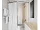 Bathroom featuring a shower with curtain, a clean, modern toilet, and a well-lit vanity at 9002 Palmetto Dr # 420, Isle of Palms, SC 29451