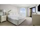 Relaxing bedroom with a king bed, ocean view, and balcony access for enjoying the sea breeze at 9002 Palmetto Dr # 420, Isle of Palms, SC 29451