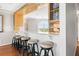 Convenient breakfast bar with seating, connecting the kitchen and living areas at 9002 Palmetto Dr # 420, Isle of Palms, SC 29451