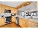 Updated kitchen with stainless steel appliances and a breakfast bar overlooking the living area at 9002 Palmetto Dr # 420, Isle of Palms, SC 29451