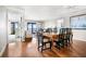 Bright open-concept living room with hardwood floors and access to the balcony and ocean views at 9002 Palmetto Dr # 420, Isle of Palms, SC 29451