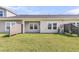 Spacious backyard featuring green grass and a view of the back of other homes in the community at 913 Dusk Dr, Summerville, SC 29486