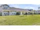 Exterior shot of multiple homes lined up in the backyard area, with privacy fences separating each yard at 913 Dusk Dr, Summerville, SC 29486