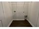 Spacious laundry room with hookups and wire rack shelving above at 913 Dusk Dr, Summerville, SC 29486