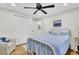 Bedroom with white walls, a ceiling fan, and a closet with bi-fold doors at 920 Simmons Ave, Summerville, SC 29483