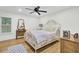 Light-filled bedroom with hardwood floors, ceiling fan, and classic decor at 920 Simmons Ave, Summerville, SC 29483
