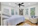 Cozy bedroom with lots of windows, natural light, and a reading chair at 920 Simmons Ave, Summerville, SC 29483
