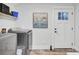 Well-lit laundry room with modern appliances and a convenient exterior door at 920 Simmons Ave, Summerville, SC 29483
