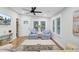 Cozy living room featuring stylish seating, hardwood floors, and bright windows at 920 Simmons Ave, Summerville, SC 29483