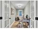 Bright home office with natural light, french doors, and hardwood floors at 920 Simmons Ave, Summerville, SC 29483