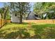 Wide backyard view with a fire pit and backyard and houses at St, Charleston, SC 29407