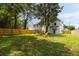 A view of the backyard with a fire pit and chairs with a view of the house at St, Charleston, SC 29407