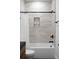 Bathroom featuring light-colored tiled shower/tub combination with a black showerhead and fixtures at St, Charleston, SC 29407