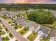 Community with scenic lake views, lush landscaping, and well-kept houses offering a picturesque living environment at 106 Sago Ct, Summerville, SC 29486